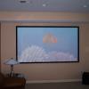 106" acousticly transparent screen (the left, center, and right speakers are behind the screen).